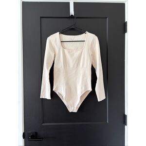 OQQ Slimming Form Fitting Body Suit Square Neck Line in Cream Size Large